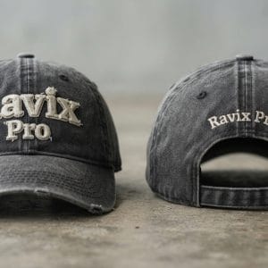Custom Washed Charcoal Distressed Baseball Cap with 3D Puff Embroidery – front and back view, custom manufactured by Ravix Pro Industry, Sialkot