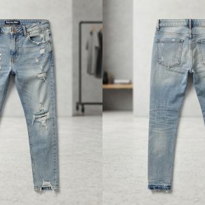 Custom Ripped Light Jeans with Thigh Logo – front and back view, custom manufactured by Ravix Pro Industry, Sialkot