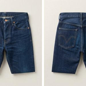 Custom Dark Wash Denim Shorts with Pocket Logo – front and back view, custom manufactured by Ravix Pro Industry, Sialkot