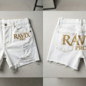 Custom White Distressed Denim Shorts with Gold Embroidery – front and back view, custom manufactured by Ravix Pro Industry, Sialkot