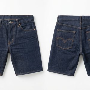 Custom Raw Denim Shorts with Pocket Script – front and back view, custom manufactured by Ravix Pro Industry, Sialkot