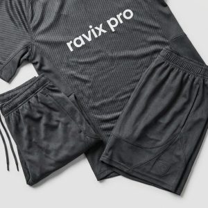 Custom Charcoal Mesh Training Soccer Kit – front and back view, custom manufactured by Ravix Pro Industry, Sialkot
