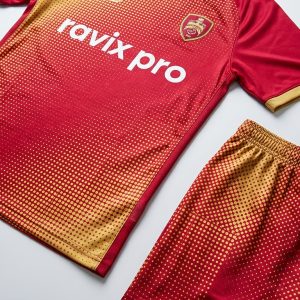 Custom Red and Gold Halftone Soccer Kit – front and back view, custom manufactured by Ravix Pro Industry, Sialkot