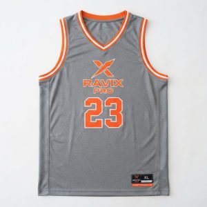 Custom Grey and Orange Basketball Jersey – custom manufactured by Ravix Pro Industry, Sialkot, Pakistan