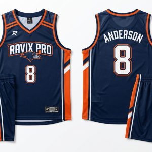 Custom Navy and Orange Basketball Uniform with Side Panel Stripes – custom manufactured by Ravix Pro Industry, Sialkot, Pakistan