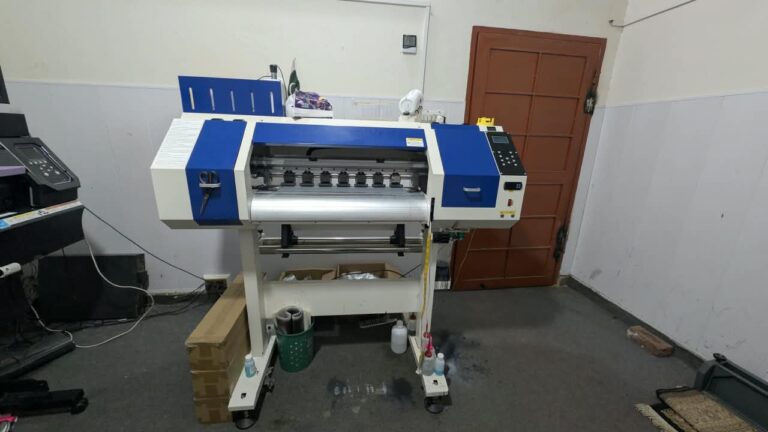 DTF (direct-to-film) printer for full-colour transfers at Ravix Pro Industry clothing factory in Daska, Sialkot, Pakistan