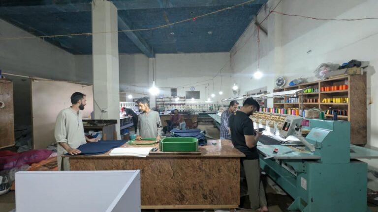 Multi-head embroidery machines for logos and badges at Ravix Pro Industry clothing factory in Daska, Sialkot, Pakistan