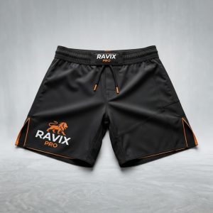 Custom Black MMA Shorts with Orange Lion Logo – custom manufactured by Ravix Pro Industry, Sialkot, Pakistan