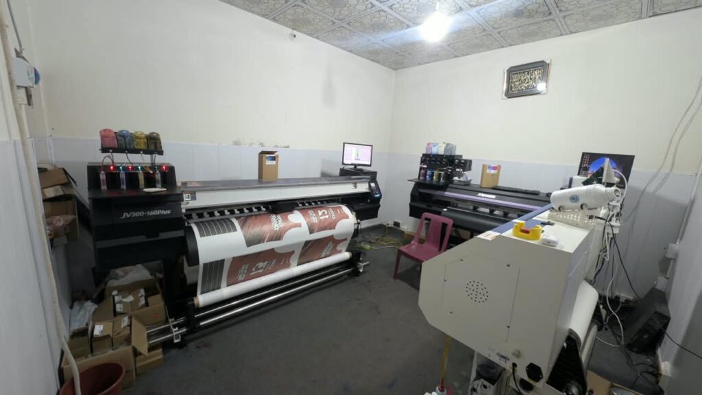 Sublimation printing room with large-format printers at Ravix Pro Industry clothing factory in Daska, Sialkot, Pakistan