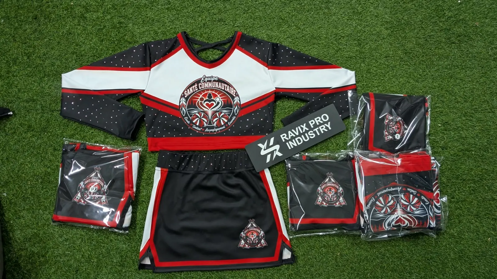 Custom cheerleading uniform with crop top and skirt made by Ravix Pro Industry clothing manufacturer in Sialkot, Pakistan