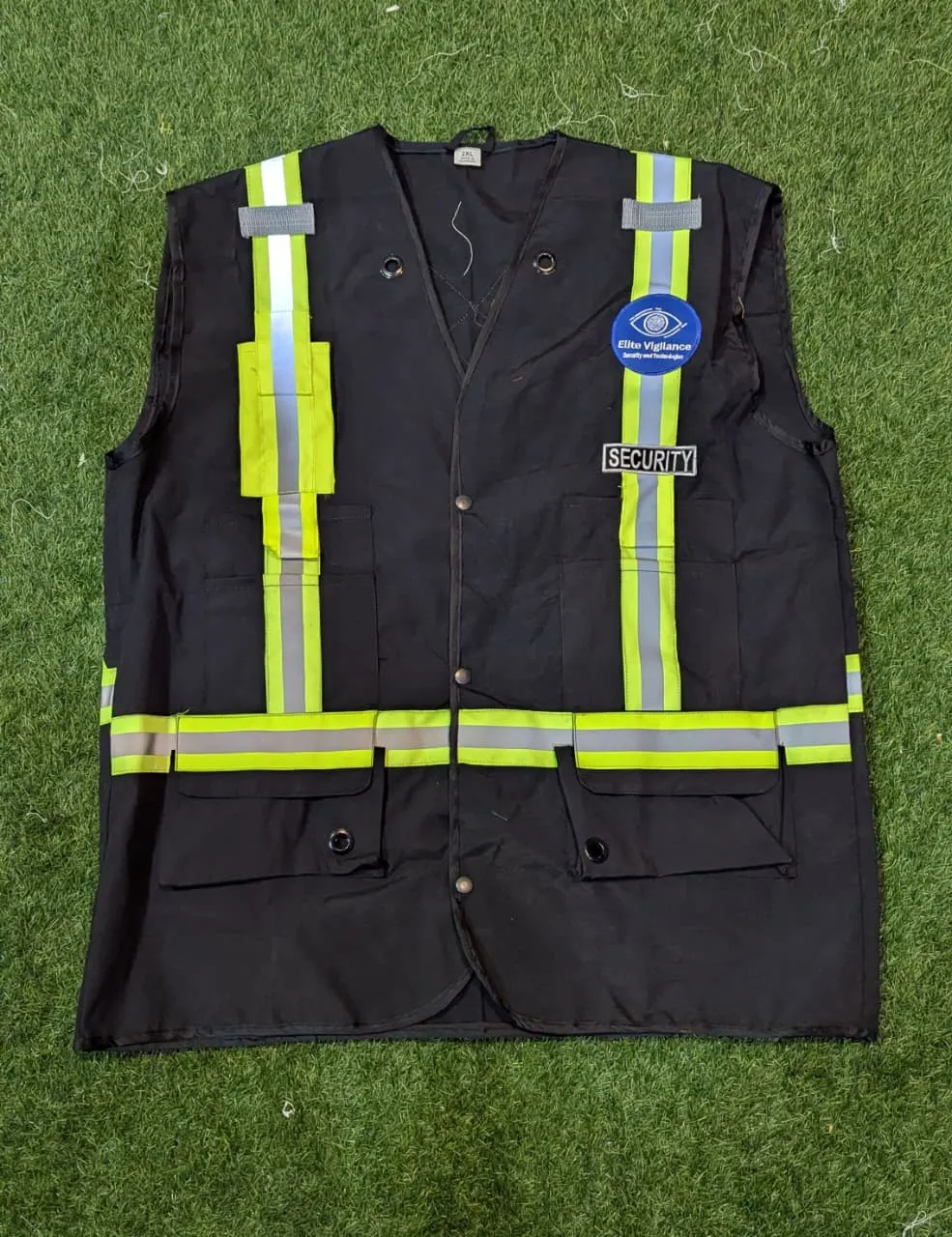 Custom navy work jacket with hi-vis reflective stripes made by Ravix Pro Industry clothing manufacturer in Sialkot, Pakistan