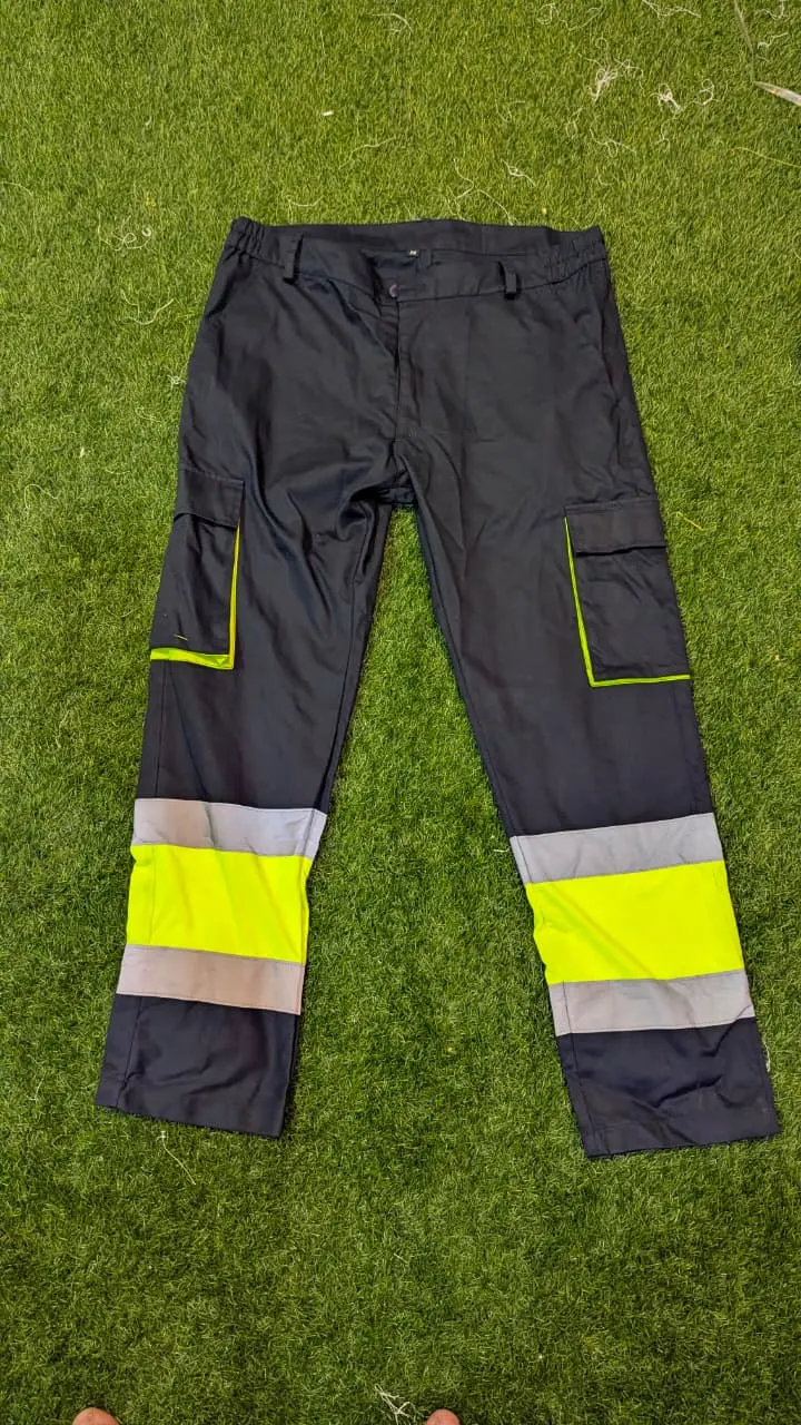Custom work cargo pants with hi-vis reflective bands made by Ravix Pro Industry clothing manufacturer in Sialkot, Pakistan