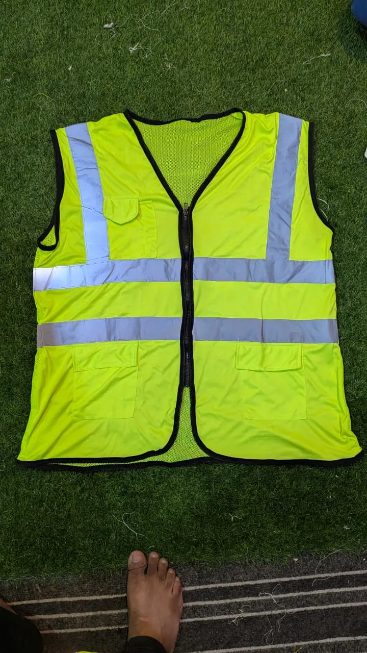 Custom yellow hi-vis safety vest made by Ravix Pro Industry clothing manufacturer in Sialkot, Pakistan