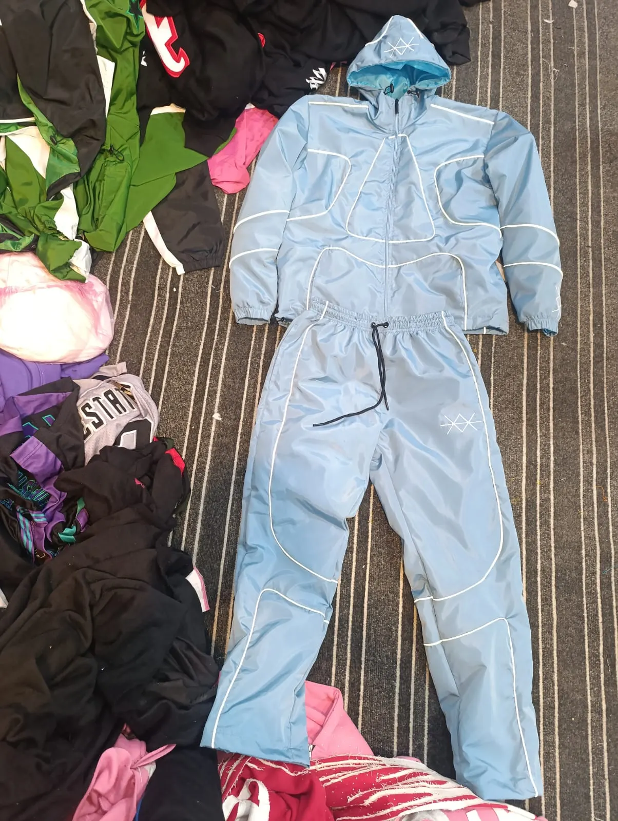 Custom light blue denim-look tracksuit made by Ravix Pro Industry clothing manufacturer in Sialkot, Pakistan