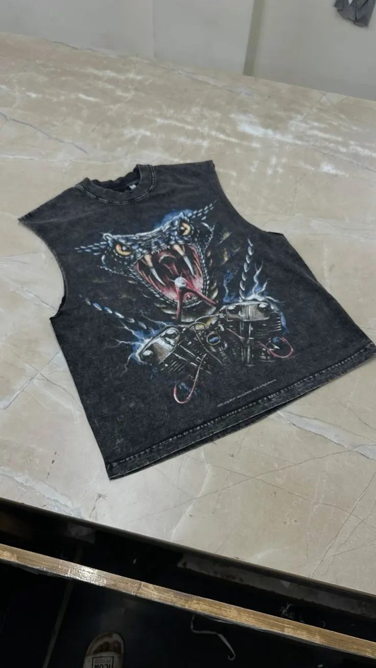 Custom black streetwear T-shirt with graphic print made by Ravix Pro Industry clothing manufacturer in Sialkot, Pakistan