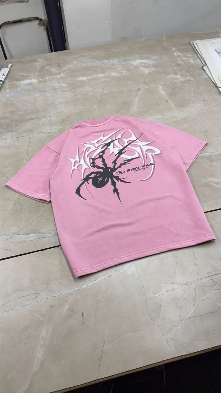 Custom pink T-shirt with graphic print made by Ravix Pro Industry clothing manufacturer in Sialkot, Pakistan
