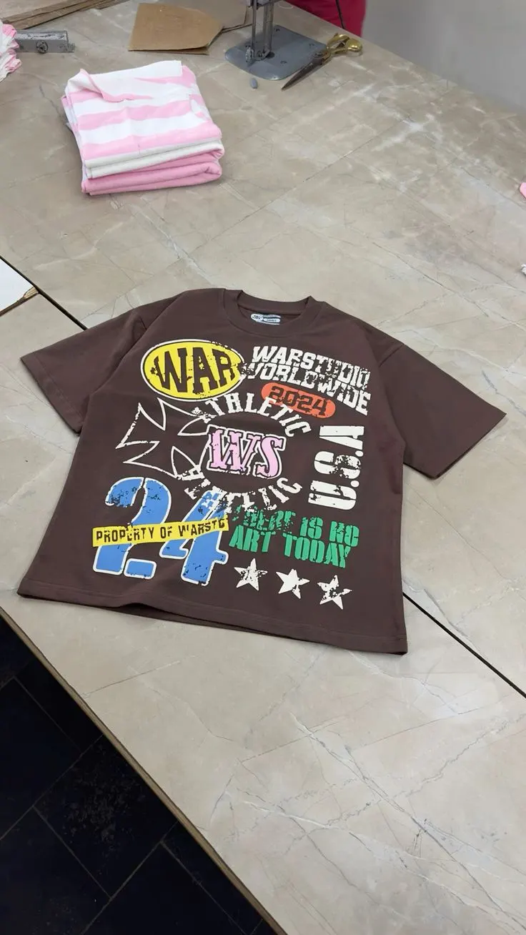 Custom brown T-shirt with all-over graphic made by Ravix Pro Industry clothing manufacturer in Sialkot, Pakistan