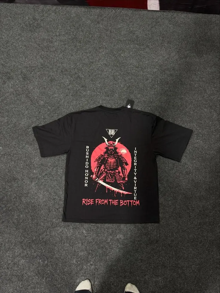 Custom black T-shirt with red screen print made by Ravix Pro Industry clothing manufacturer in Sialkot, Pakistan