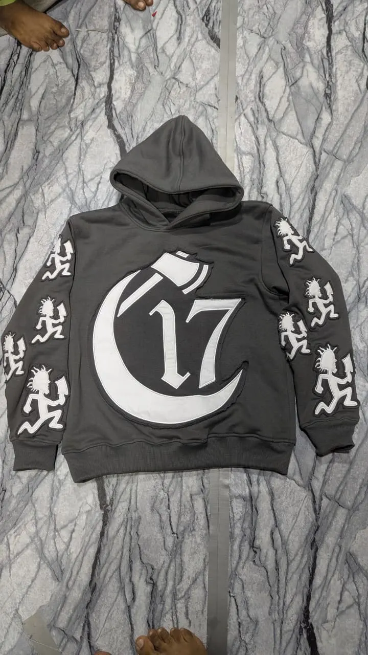 Custom grey zip hoodie with puff print made by Ravix Pro Industry clothing manufacturer in Sialkot, Pakistan