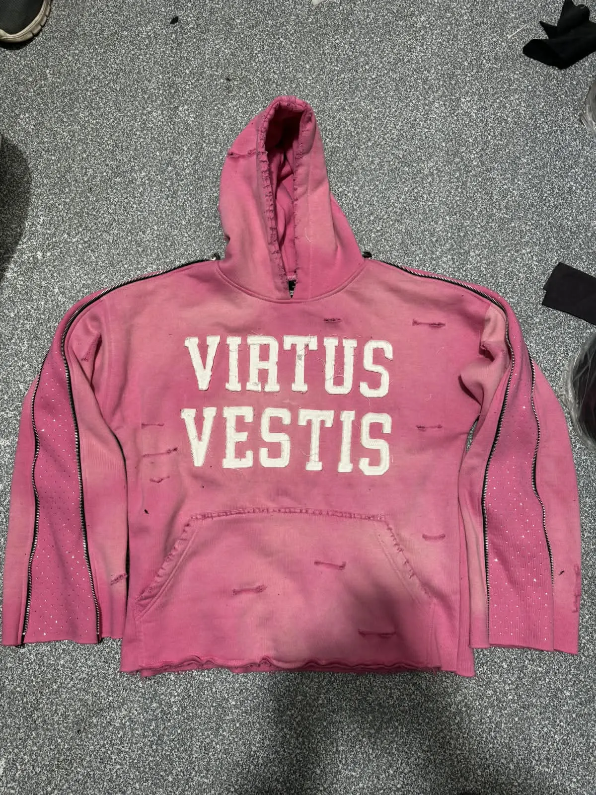 Custom washed pink hoodie with puff print lettering made by Ravix Pro Industry clothing manufacturer in Sialkot, Pakistan