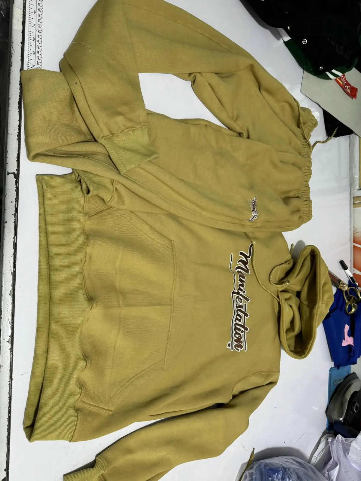 Custom mustard hoodie with embroidered logo made by Ravix Pro Industry clothing manufacturer in Sialkot, Pakistan