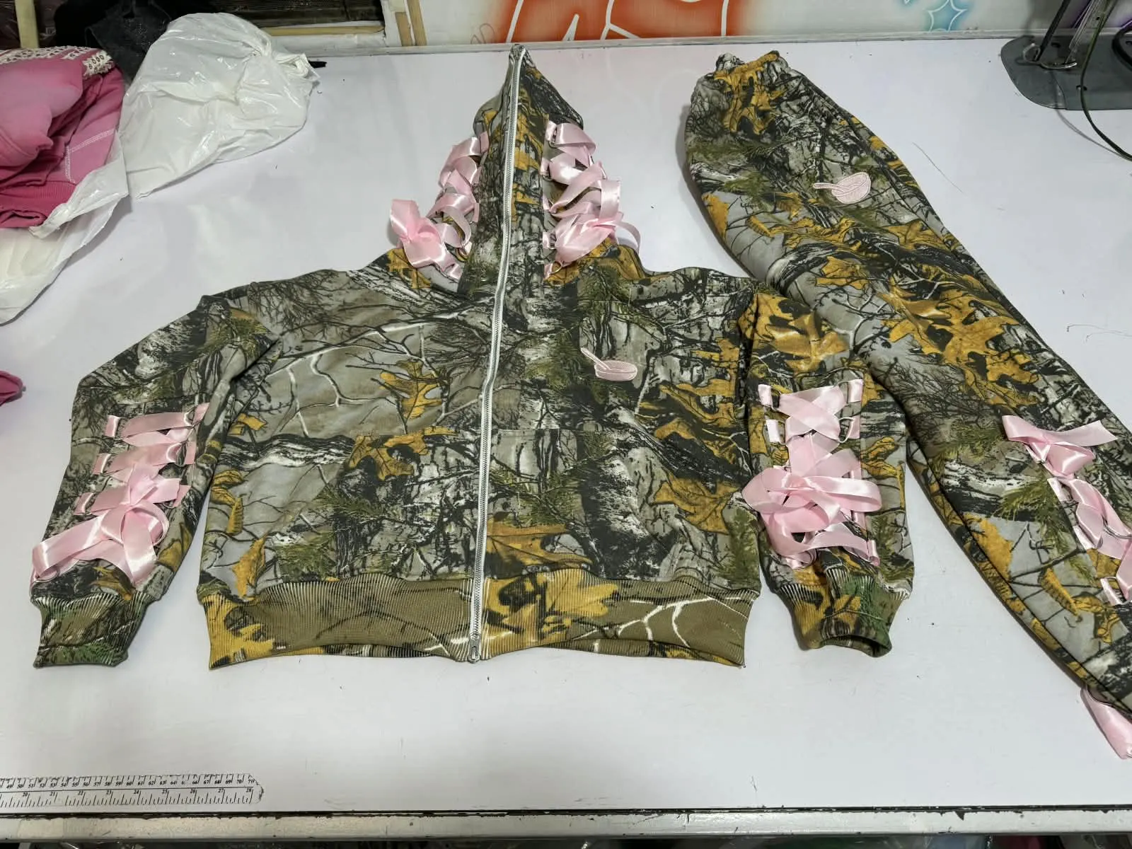 Custom camo zip hoodie and pants set made by Ravix Pro Industry clothing manufacturer in Sialkot, Pakistan
