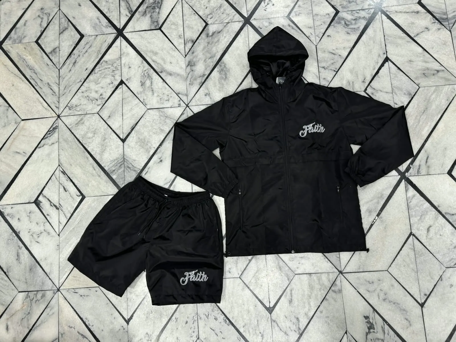 Custom black hoodie and shorts set made by Ravix Pro Industry clothing manufacturer in Sialkot, Pakistan