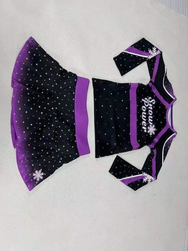 Custom cheerleading uniform with sublimated skirt made by Ravix Pro Industry clothing manufacturer in Sialkot, Pakistan