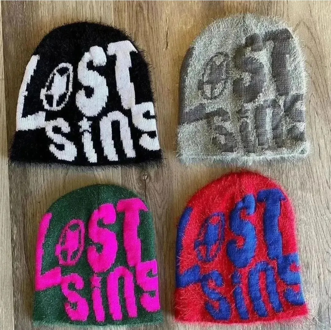 Custom jacquard knitted beanies with lettering made by Ravix Pro Industry clothing manufacturer in Sialkot, Pakistan