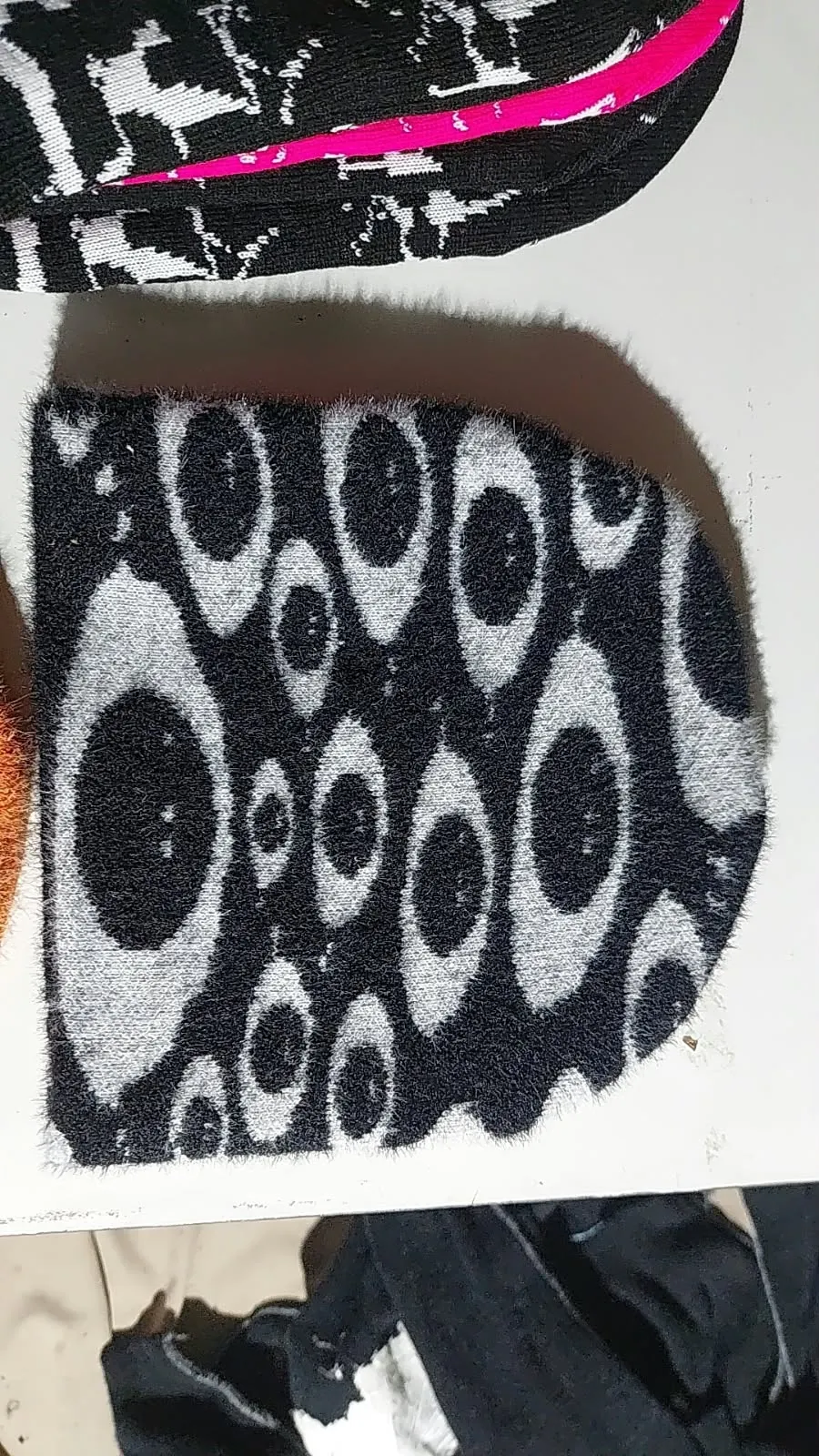 Custom jacquard knitted beanie with all-over pattern made by Ravix Pro Industry clothing manufacturer in Sialkot, Pakistan