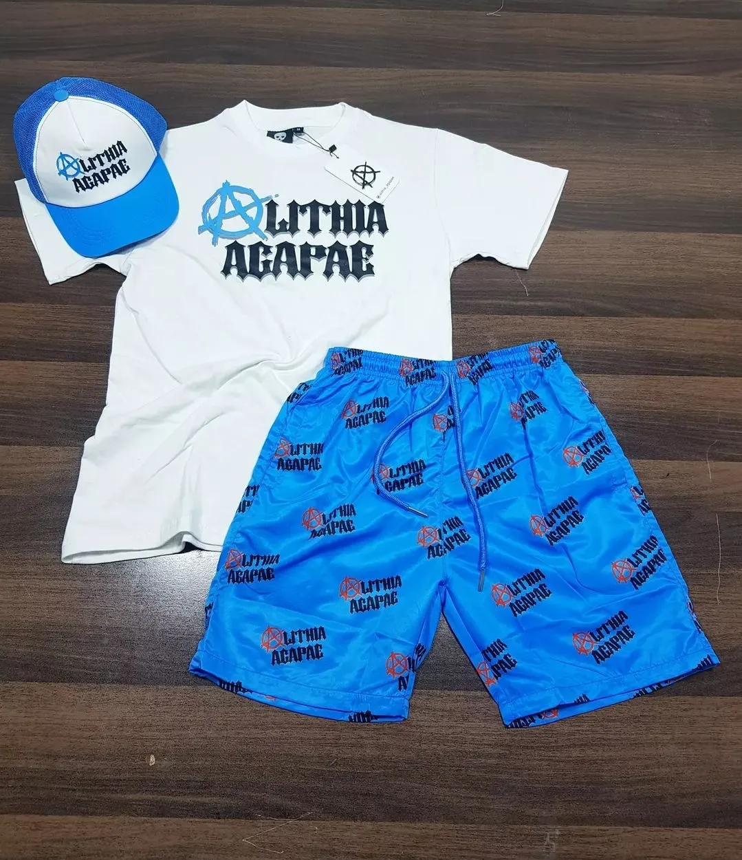 Custom T-shirt and blue printed shorts set made by Ravix Pro Industry clothing manufacturer in Sialkot, Pakistan