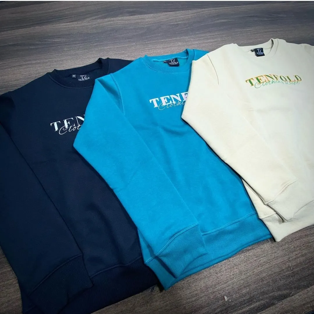 Custom crewneck sweatshirts in three colours made by Ravix Pro Industry clothing manufacturer in Sialkot, Pakistan
