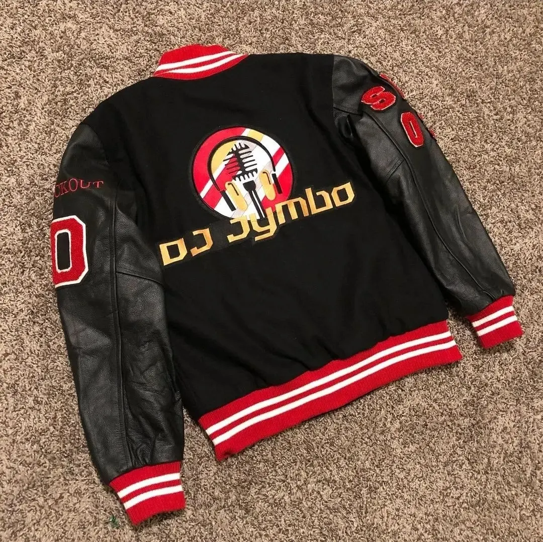 Custom black varsity jacket with embroidered patches made by Ravix Pro Industry clothing manufacturer in Sialkot, Pakistan