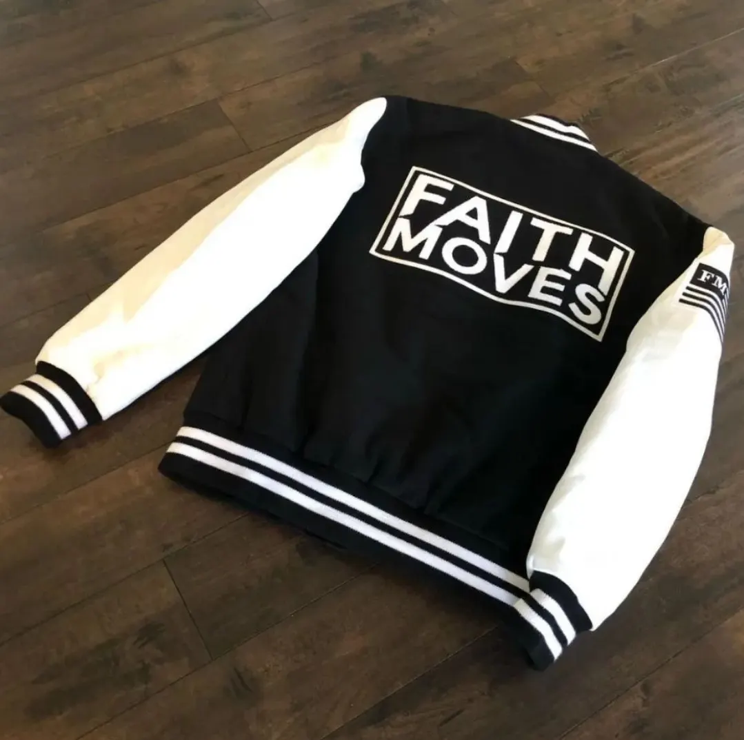 Custom black varsity jacket with chenille patch made by Ravix Pro Industry clothing manufacturer in Sialkot, Pakistan
