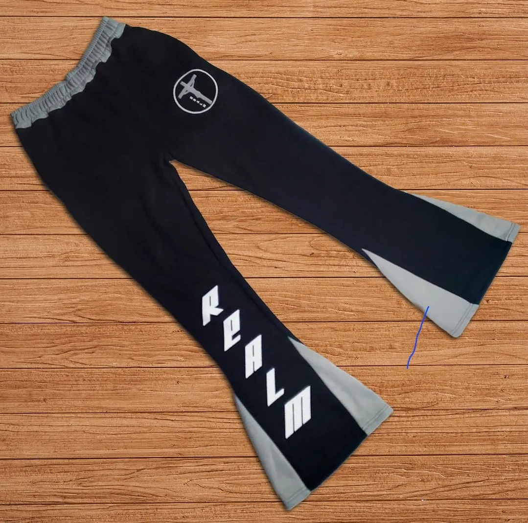 Custom navy flare sweatpants with printed details made by Ravix Pro Industry clothing manufacturer in Sialkot, Pakistan