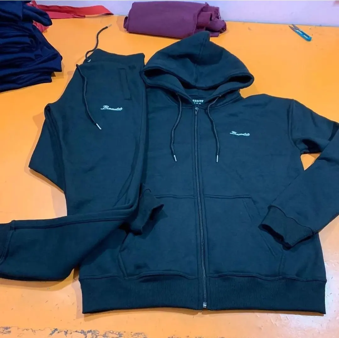 Custom teal tracksuit set made by Ravix Pro Industry clothing manufacturer in Sialkot, Pakistan