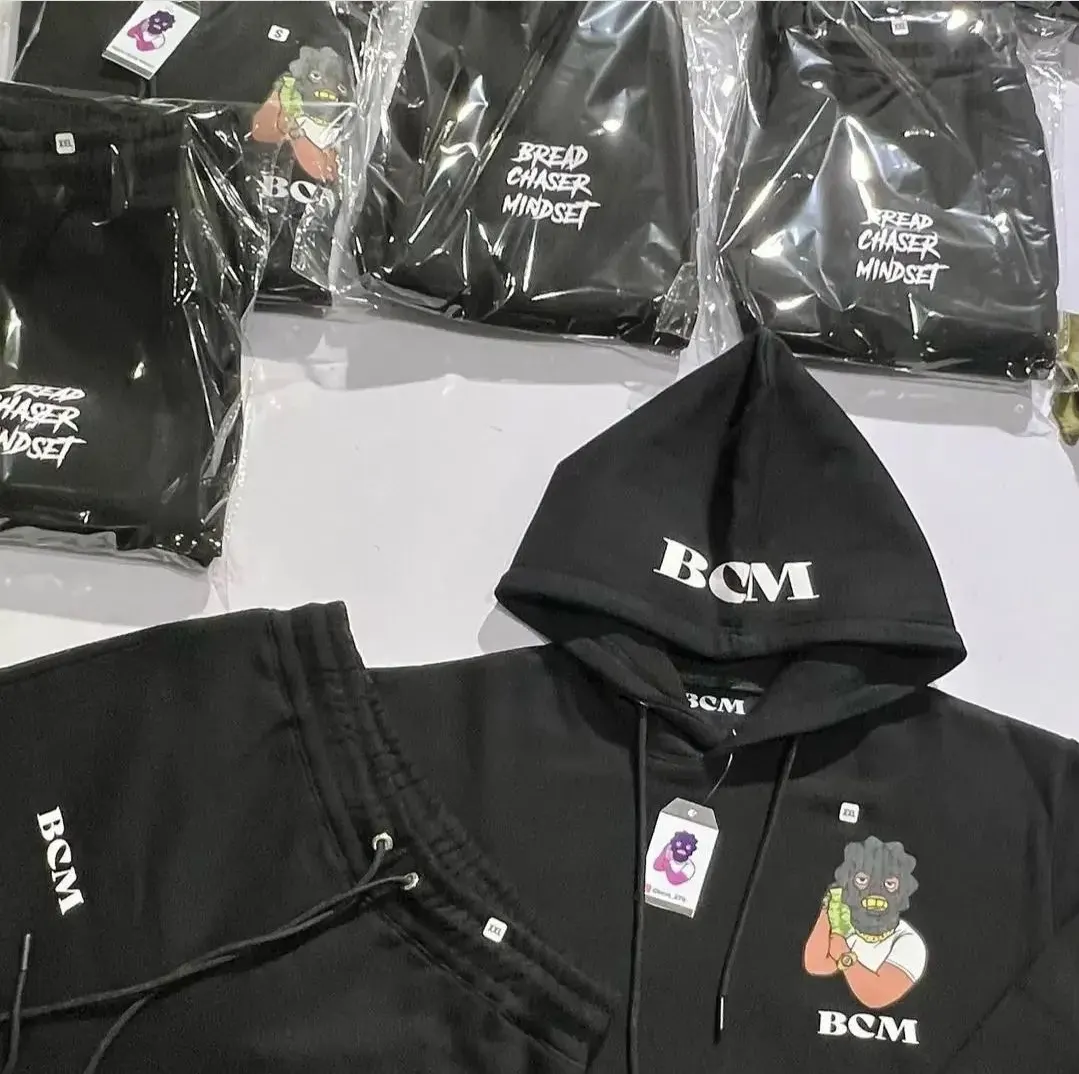 Custom black hoodies packed for a bulk order made by Ravix Pro Industry clothing manufacturer in Sialkot, Pakistan