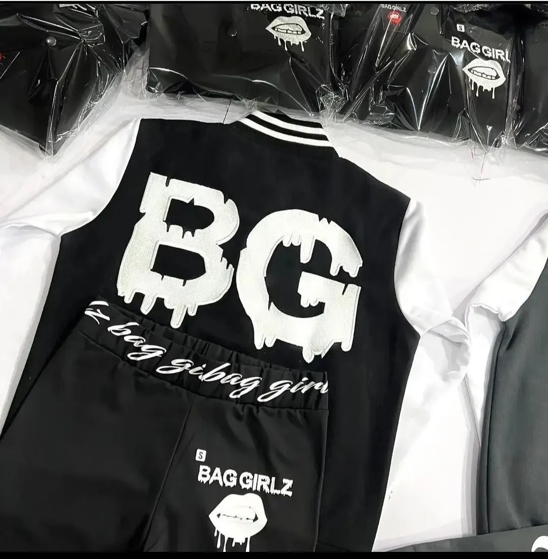 Custom black varsity jacket with puff print back made by Ravix Pro Industry clothing manufacturer in Sialkot, Pakistan
