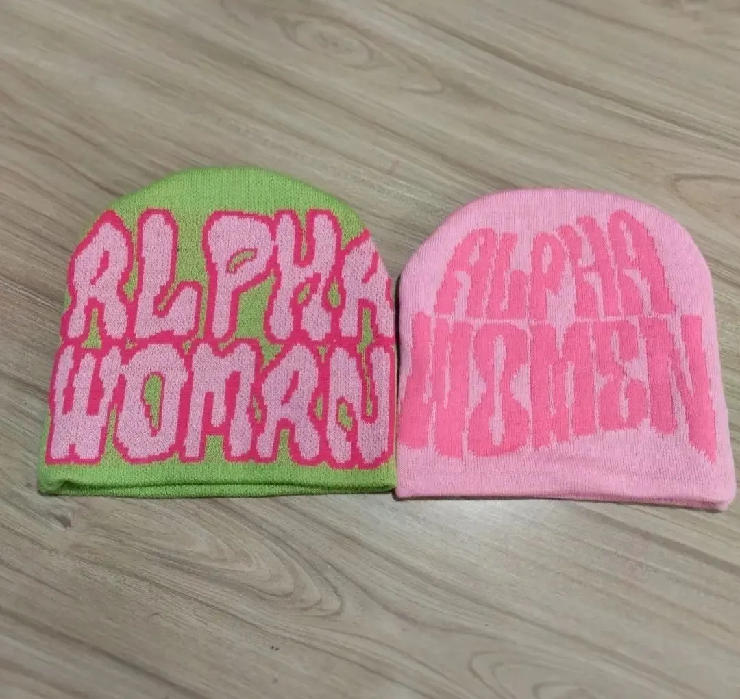 Custom jacquard knitted beanies with lettering made by Ravix Pro Industry clothing manufacturer in Sialkot, Pakistan
