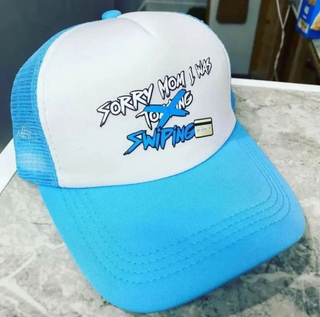Custom trucker cap with printed front made by Ravix Pro Industry clothing manufacturer in Sialkot, Pakistan
