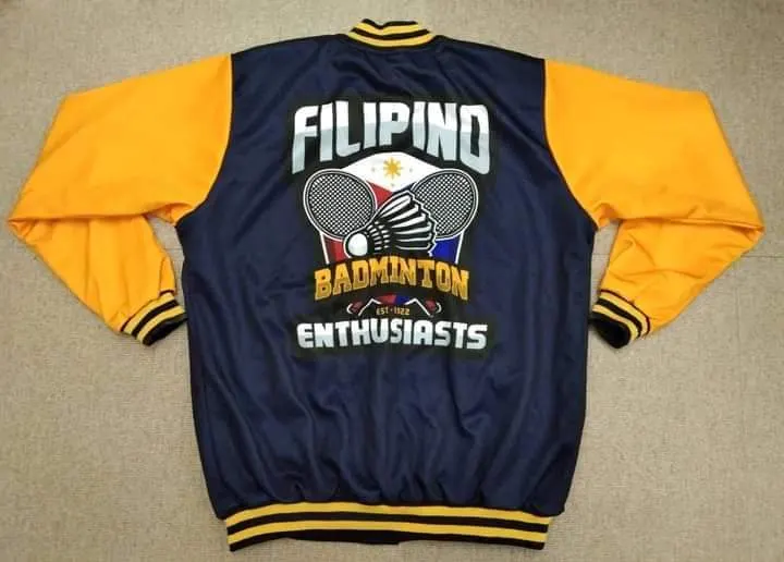 Custom navy and gold varsity jacket with embroidery made by Ravix Pro Industry clothing manufacturer in Sialkot, Pakistan