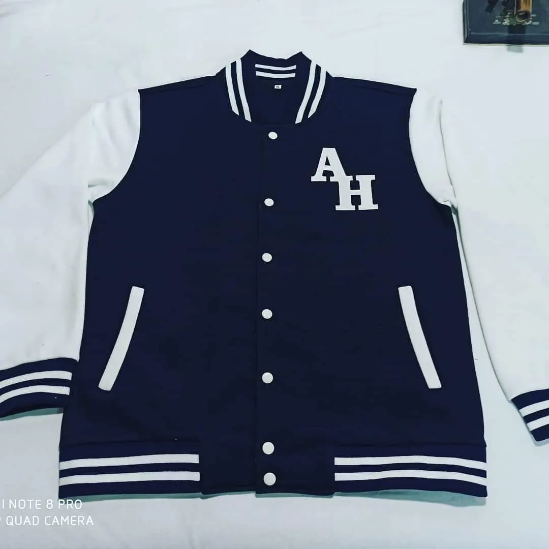 Custom navy varsity jacket with chenille letters made by Ravix Pro Industry clothing manufacturer in Sialkot, Pakistan