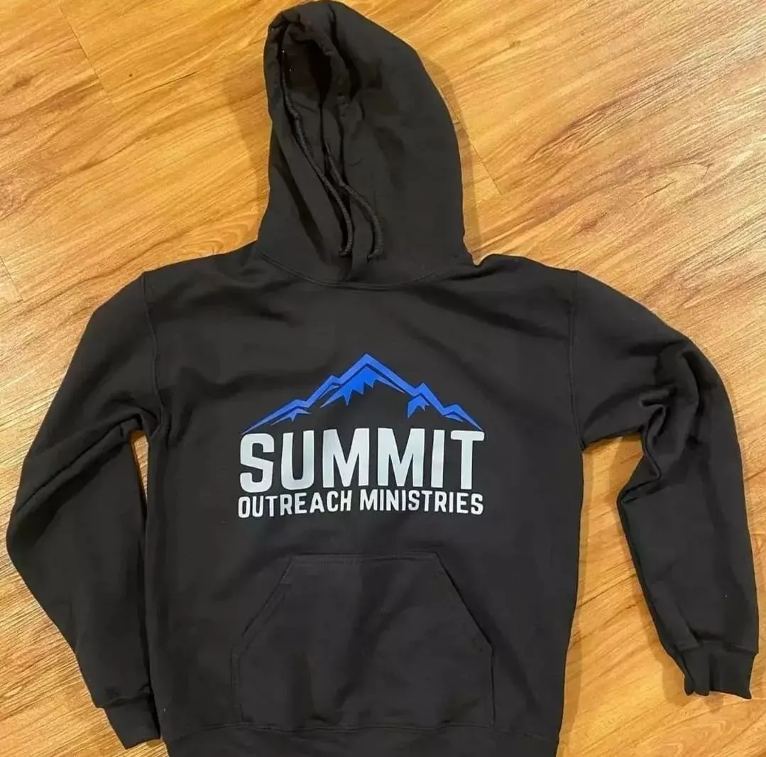 Custom black hoodie with printed logo made by Ravix Pro Industry clothing manufacturer in Sialkot, Pakistan