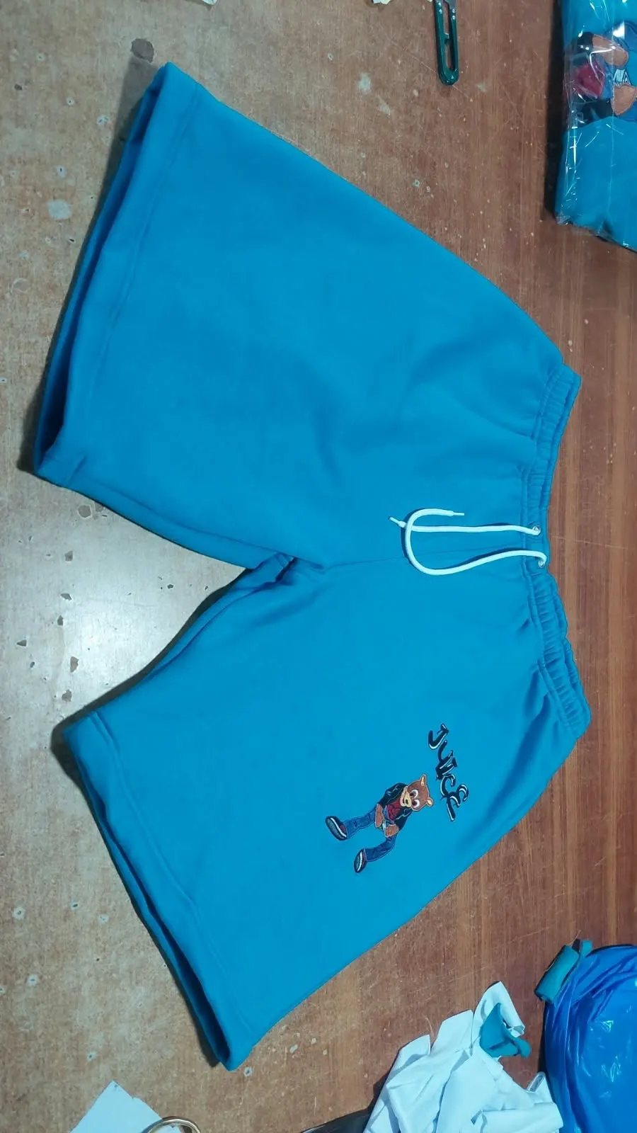 Custom blue sweat shorts made by Ravix Pro Industry clothing manufacturer in Sialkot, Pakistan
