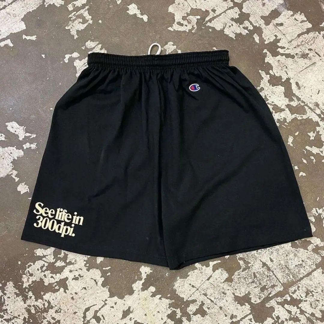 Custom black shorts with printed logo made by Ravix Pro Industry clothing manufacturer in Sialkot, Pakistan