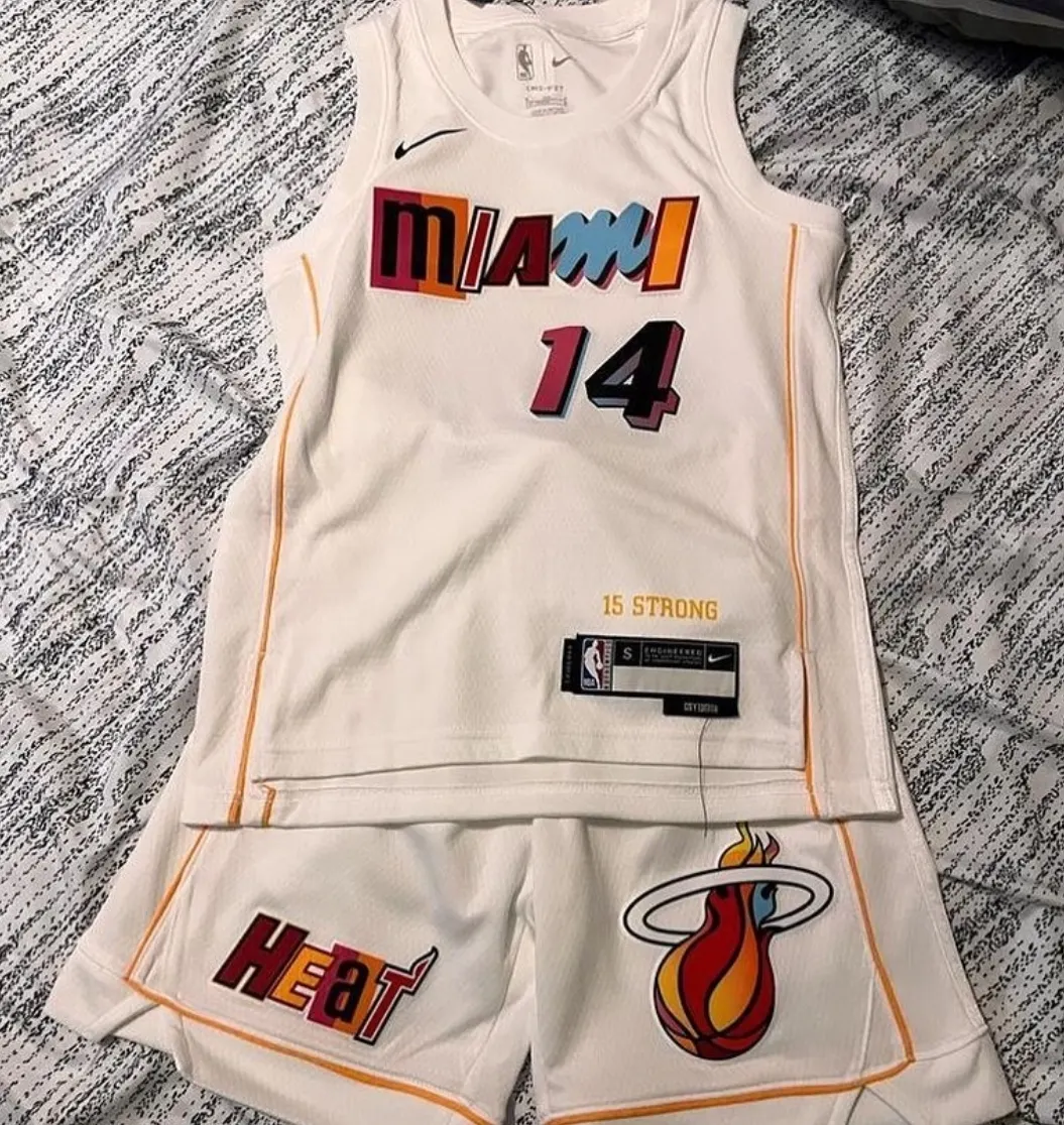 Custom basketball jersey and shorts in cream made by Ravix Pro Industry clothing manufacturer in Sialkot, Pakistan